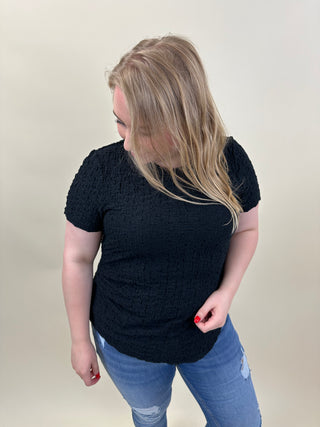VMCALISSIA SS ASSYMETRICAL O-NECK TO CUR Black